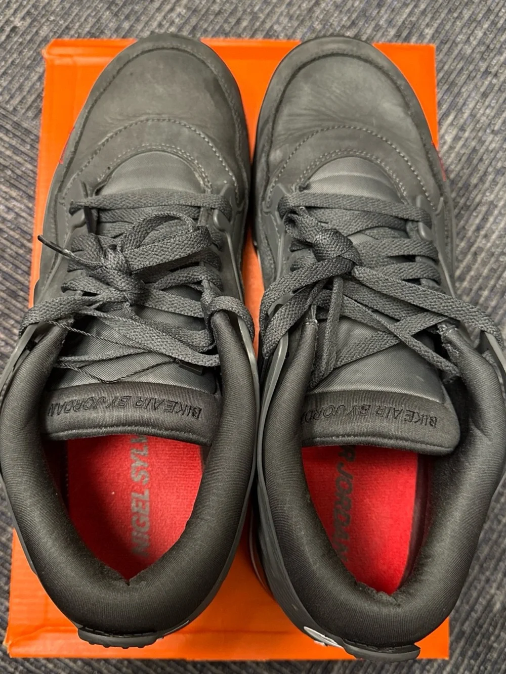 Jordan 4 RM SP Nigel Sylvester Driveway Grey Sneakers with Red Accents